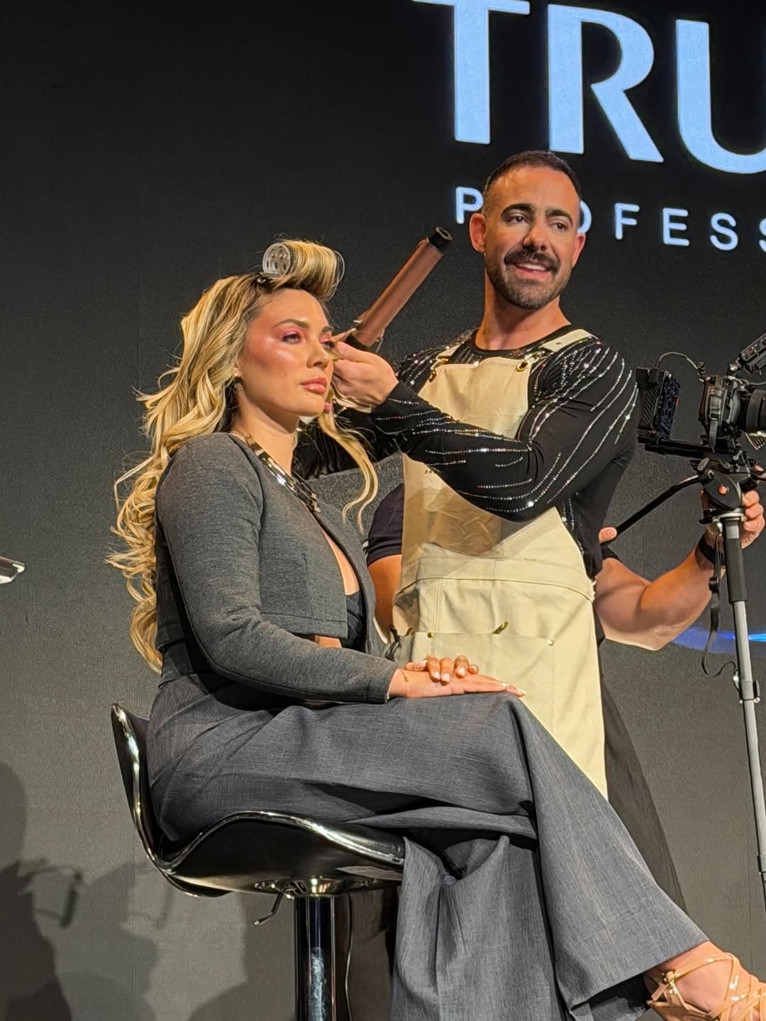Andy Macedo styling a client